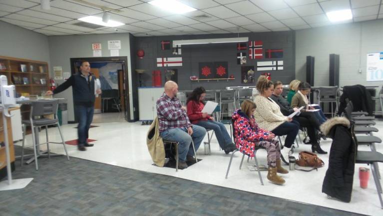 Parents asked questions and made comments. (Photo by Frances Ruth Harris)