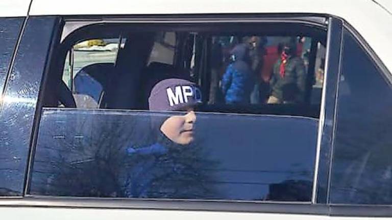 Vincent Callanan in squad car during the parade (Photo provided)