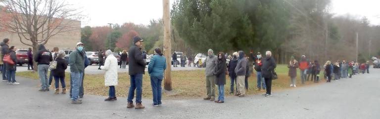 Hundreds wait in line at Dingman District 1, headquartered at Milford Bible College on Foxcroft Drive (Photo by Frances Ruth Harris)