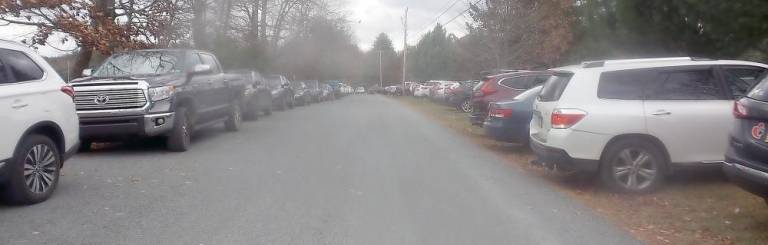 Dingman District 1 voters walked blocks to their polling place Milford Bible College from the stop sign at the end of Foxcroft Drive, which absorbed the overflow of cars since the parking lot was maxed out (Photo by Frances Ruth Harris)