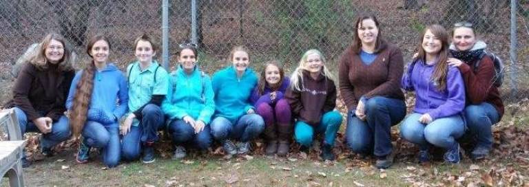 Learning about wolf packs Photo provided Pictured from left: Amy McFeely, Alice Cauchi, Kinsey Cuoco, Natalia Liszka, Abbey McFeely, Grace Liszka, Rebecca McFeely, DDMS Librarian Rachel Goldstein, Julia Liszka and Malgorzata Liszka.
