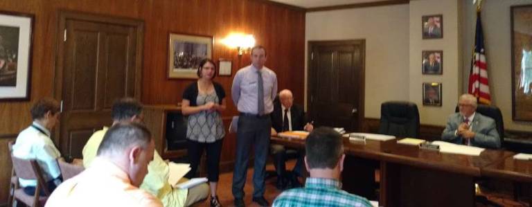 Penn State Extension coordinator Stephen Alessi and new 4H director Angela Smith speak about 4H programs to the Pike County Commissioners. (Photo by Anya Tikka)
