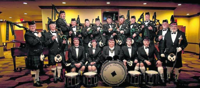 The Black Diamond Pipe Band will perform as part of the parade.