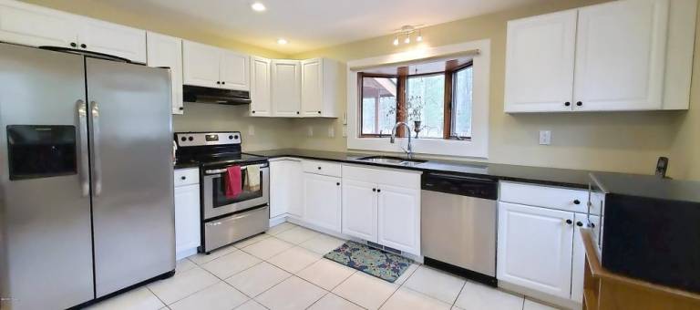 Contemporary three-bedroom offers privacy and more Kitchen