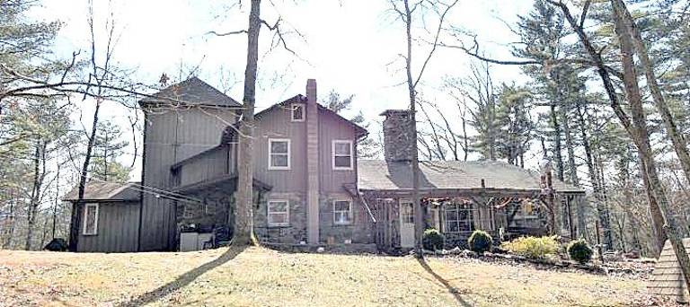 Estate home with artist studio, barn, and office building Estate home with artist studio, barn, and office building