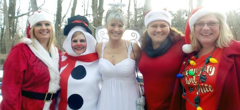 Tammy, Vicki Stauffer, Deanne Connolly, Cena Block, and Jeanne Marie Passaro, director of the Autism Project