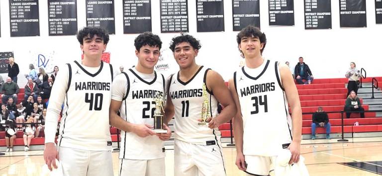DV boys’ varsity basketball team takes the championship The DVHS boys’ varsity basketball team won the championship, with Isaiah Berrios (#11) named the all-tournament most valuable player and Trey Newton (#22) named to the all-tournament team.