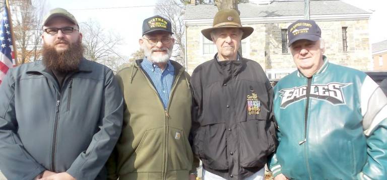 Retired veterans (from left): Airman First Class John Proffit (son), PFC John Proffit (dad), E7 Dr. Don Seagent (Army and Navy), and E5 Bob Bernathy (Navy)
