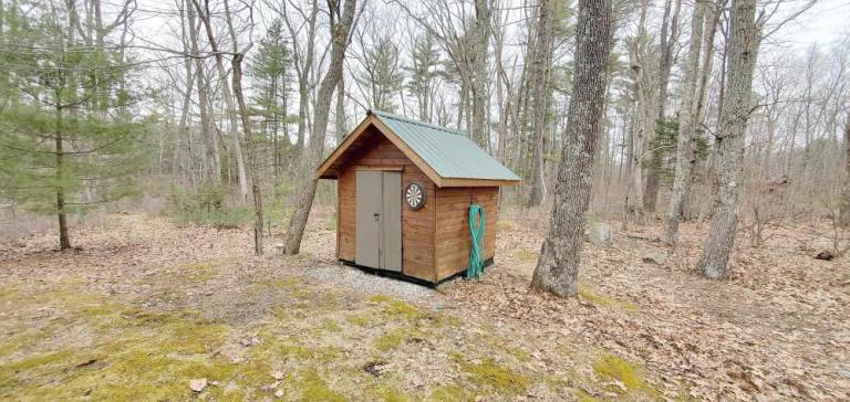 Contemporary three-bedroom offers privacy and more Yard