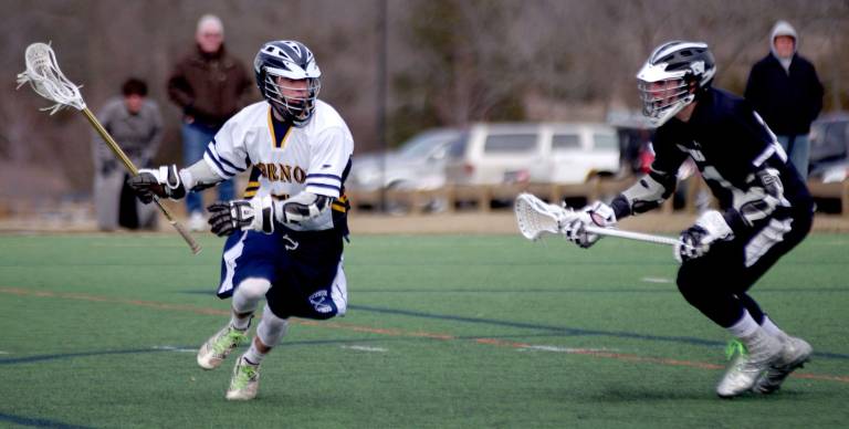 Delaware Valley lacrosse team loses to Vernon Vernon's Charlie Mills is shadowed by Delaware Valley's John Actisdano.