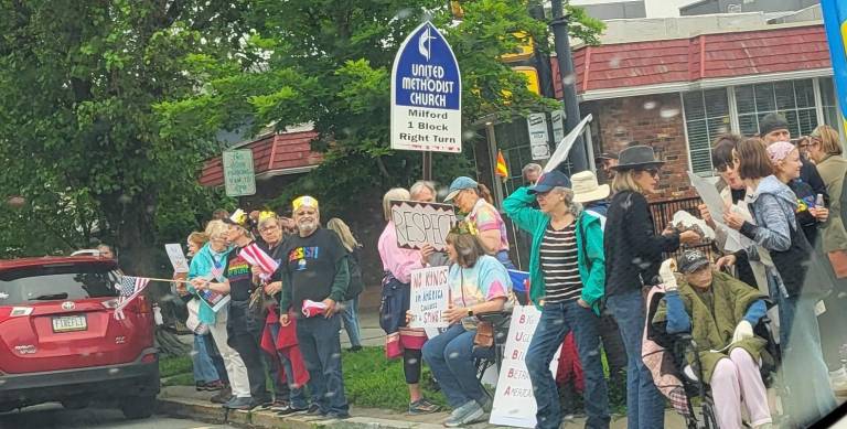Hundreds rally in area ‘No Kings Day’ protest “No Kings Day” protesters in Milford on June 14., 2025.