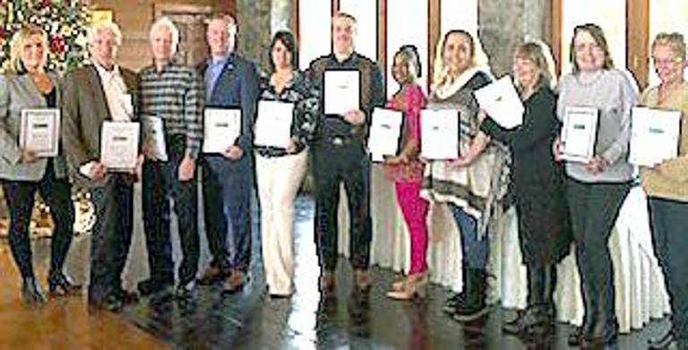 From left: Kimberly Gay, realtor; Dennis Farrelly, realtor; Tommy Farrelly, realtor; James Martin, realtor; Stephanie Troiani, realtor; Thomas Waslowski, realtor; Annette Dot Ifill, realtor; Beth Schutte, realtor; Carol Demarest, realtor; Kathy Skillman, associate broker; and Kathy Louis, associate broker