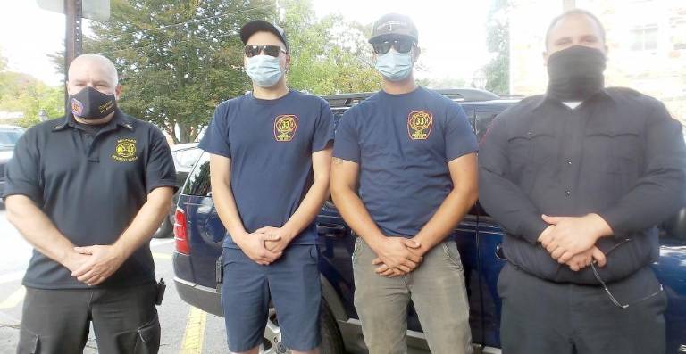 Members of the Milford Fire Department (from left): Captain Mike Bello, Lt. Andy Fortuin, Jake Peters, and Eric Passaro (Photo by Frances Ruth Harris)