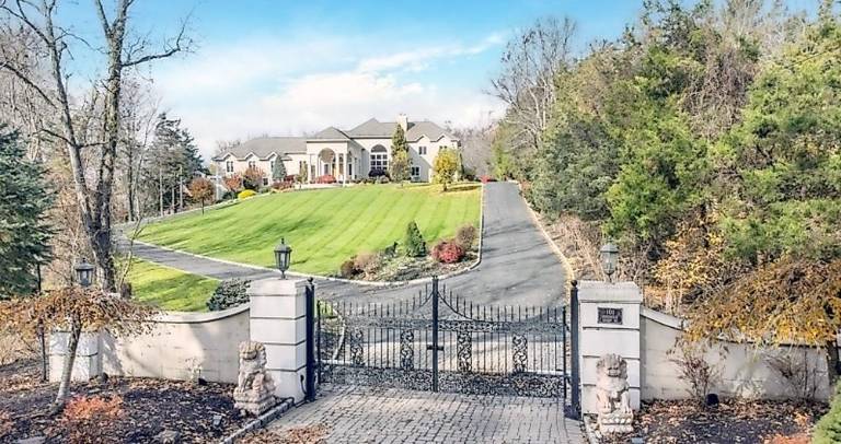 Custom estate includes car charging station, hot yoga room, and frescos Custom estate includes car charging station, hot yoga room, and frescos