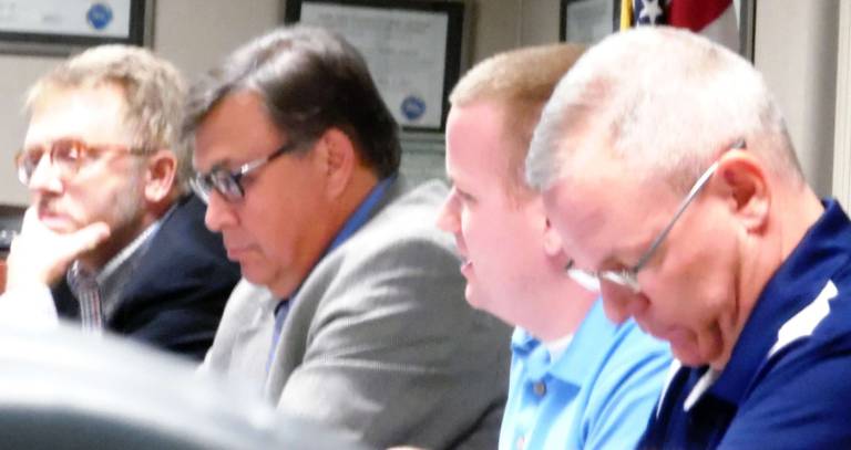 Small kindergarten class points to decline in enrollment From left: school board members Brian Carso, Jack Fisher, and Zachary Pearce; and Superintendent John Bell (Photo by Anya Tikka)