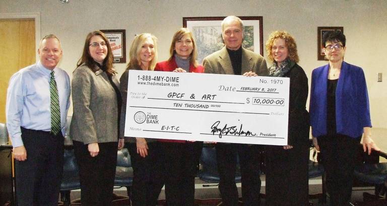 Dime Bank donates $10K to innovative education Pictured (from left): Dr. John Bell, Delaware Valley Superintendent; Amy L. Burke, assistant vice president and branch manager for The Dime Bank; Jenni Hamill, executive director of the Greater Pike County Community Foundation; Deb Unflat, vice president of marketing for The Dime Bank; Jeffrey David Stocker, director of the American Readers Theatre; Dr. Peg Schaffer, DV's director of elementary education; and Dr. Gina Vitacco-Vives, DV's director of curriculum and technology. (Photo provided)