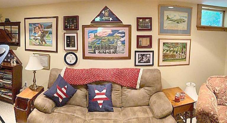The memorial wall in Kim Pearce‘s basement honoring his father and his brother Jack (Photo provided)