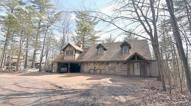 Estate home with artist studio, barn, and office building Office/garage