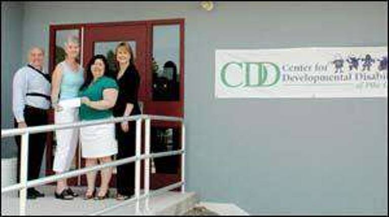Cellular One donates to Pike disabilities center Cellular One donates to Pike disabilities center