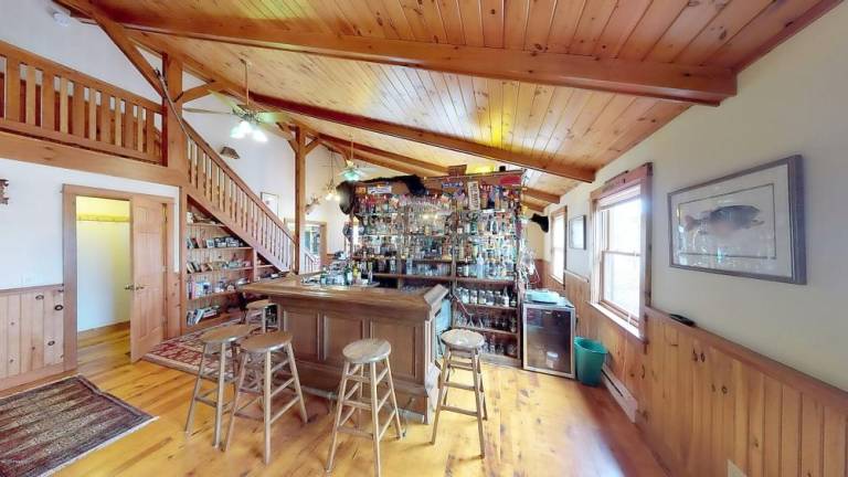 Custom three-bedroom on secluded, historic acre with lake rights Bar