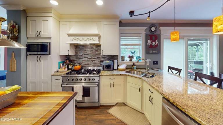 Beautifully designed home on 5+ acres offers space and privacy Beautifully designed home on 5+ acres offers space and privacy
