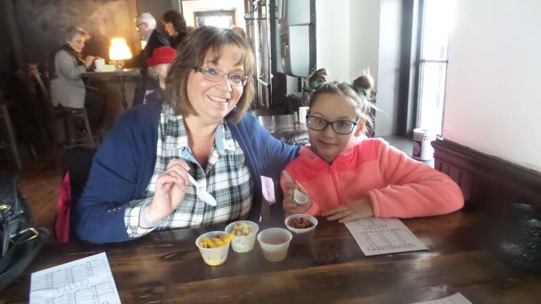 Cooks and tasters agree: Everybody wins Bernice Williams and granddaughter Marissa Gates. Williams won both the mac ‘n cheese (first place) and chili (third place) contests. (Photo by Frances Ruth Harris)
