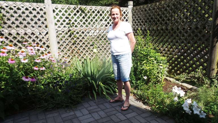 Milford's gardens, revealed Kelli Hankins in her garden at 106 Ryan Lane