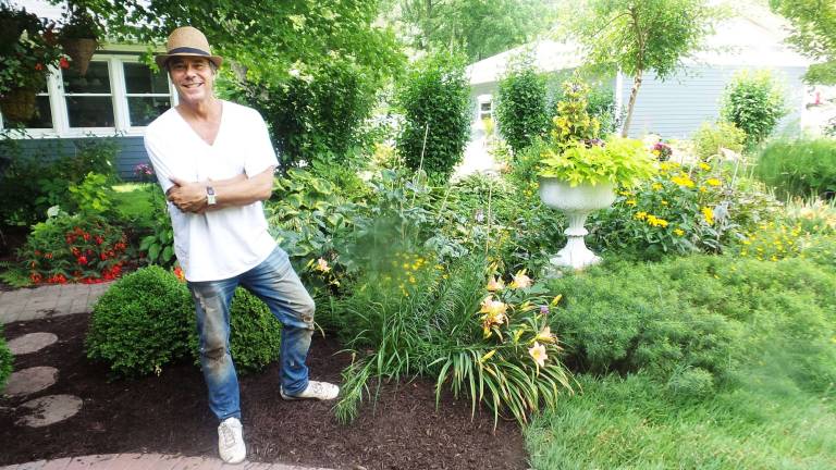 Milford's gardens, revealed Vandevender in his garden at 303 West High Street