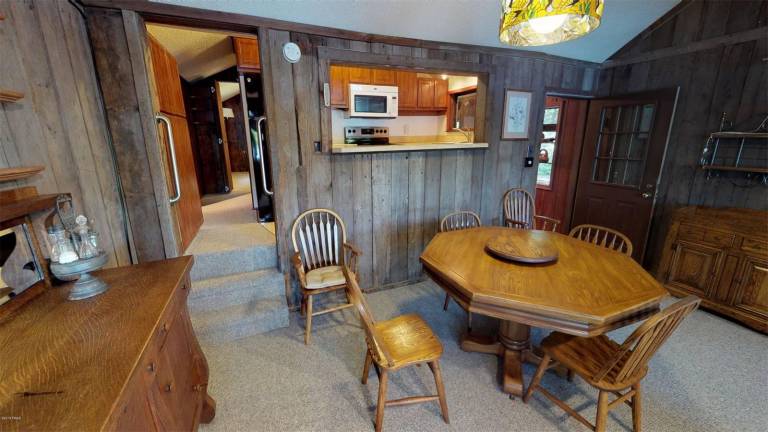 Four-bedroom lakefront contemporary is just steps from beach Dining room