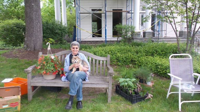 Gardens grow with help from annual plant sale Sheila Salmon with Bebe, her French Pomeramiam from Underdog Rescue in Florida (Photo by Frances Ruth Harris)