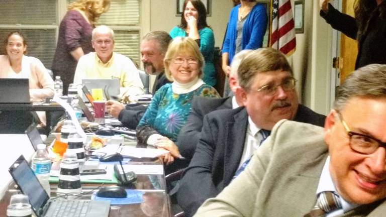 'The Leader In Me' The usually somber school board meeting lightened up fast, thanks to students from Dingman Delaware (Photo by Anya Tikka)