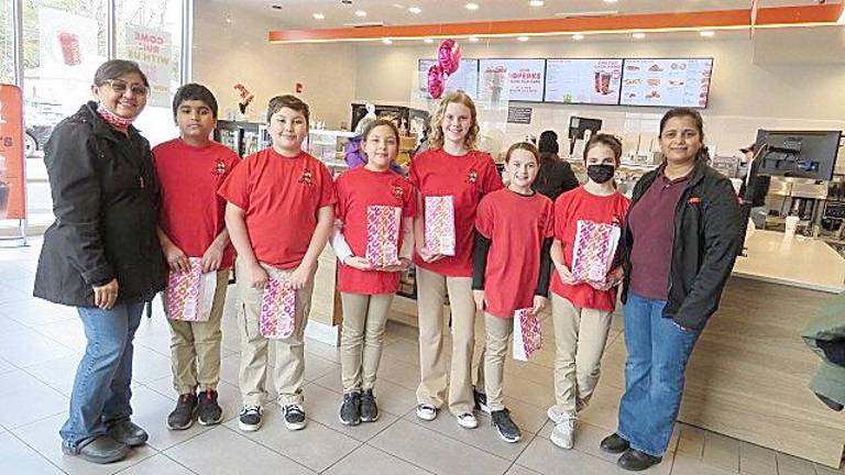 Left to right: Mrs. Mittal Patel, Ruchit Patel, Rocco Paradiso, Addison Pousley, Corey Cook, Peyton Copertino,