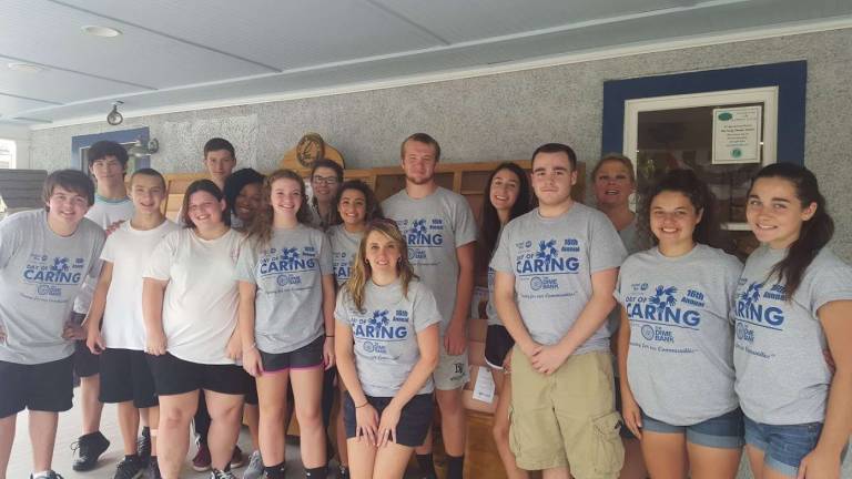 Day of Caring helps those who help others Volunteers at a past Day of Caring (Photo provided)