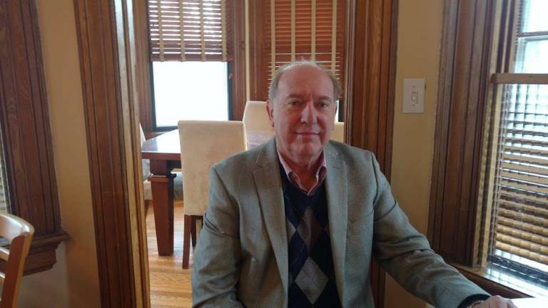 Milford's bus to Women's March is getting national attention Ed Gragert, an organizer of Milford's bus to D.C., in the Patisserie Fauchere (Photo by Anya Tikka)