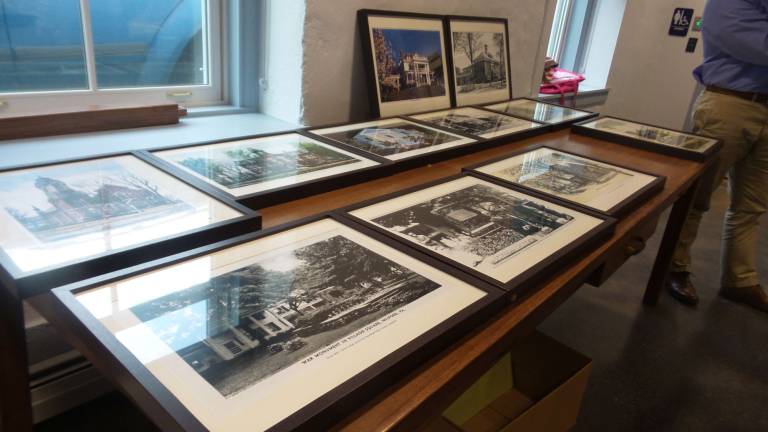 Skip Gregory's historic photos to grace meeting hall Historical photos from the collection of Randolph "Skip" Gregory will hang in the borough meeting hall for perpetuity (Photo by Frances Ruth Harris)