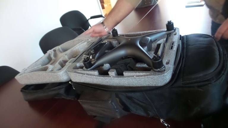 World drone fleet ConnexiCore moving to Milford Frank Segarra keeps his drone and its accessories in a backpack (Photo by Frances Ruth Harris)