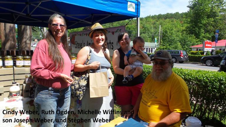 Food, music, and purring alpacas Cindy Weber, Ruth Ogden, Michelle Wiffins and son, and Stephen Weber