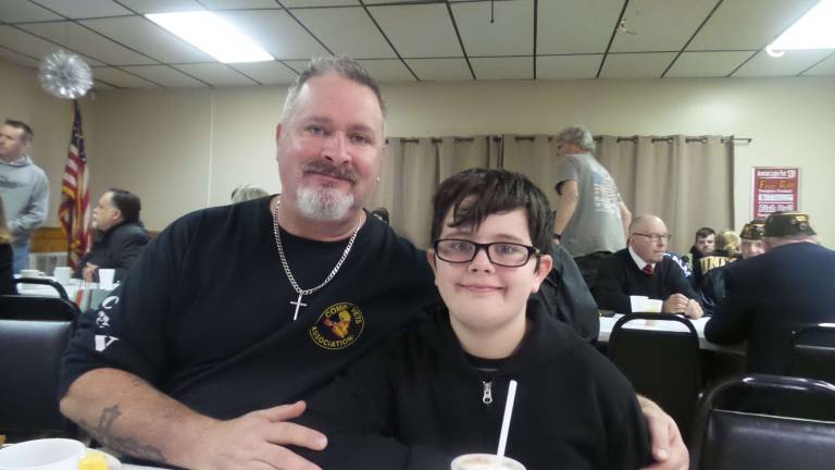 'Our freedom will never be free' Veteran Nick Sansevero and his son Dominic (Photo by Frances Ruth Harris)