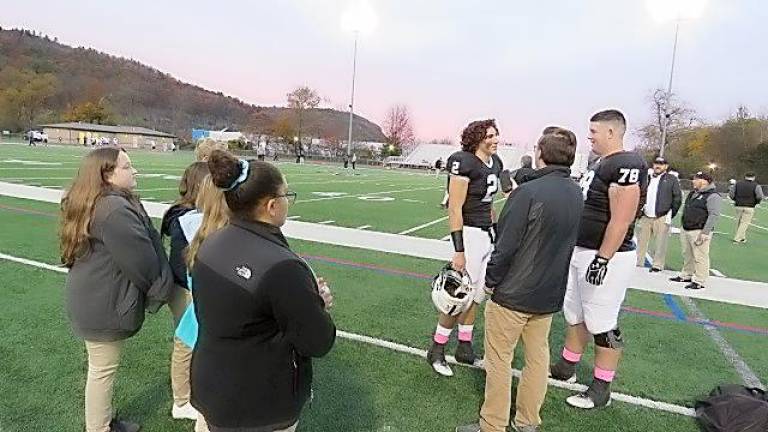 Paulie Weinrich and Justin Hernandez being interviewed by Jake Graziano as DVE-News/TV reporters shadowed the interview