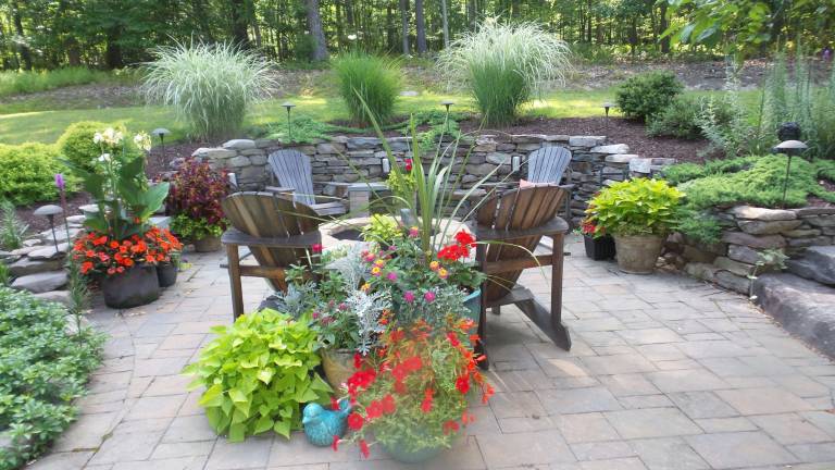 How does your garden grow? Town and Country Secret Garden Tour of the Milford Garden Club takes in everything from koi How does your garden grow? Town and Country Secret Garden Tour of the Milford Garden Club takes in everything from koi