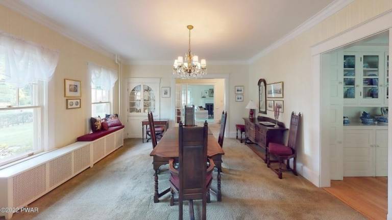 Prominent 4-bedroom Dutch colonial in the heart of Milford has it all