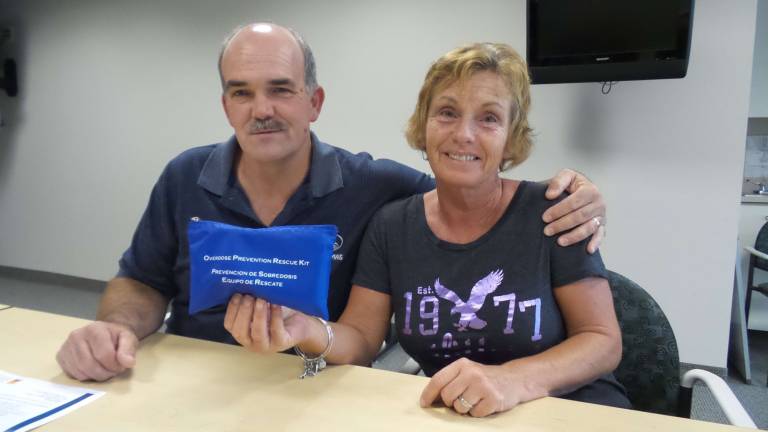 Parents: Naloxone saves lives Joe and Debra Nason displaying a Naloxone kit (Photo by Frances Ruth Harris)