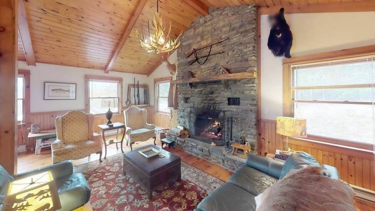Custom three-bedroom on secluded, historic acre with lake rights Fireplace
