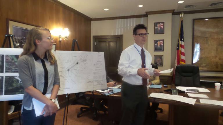 Mott Street Bridge's history may be preserved amid repairs Lindsay Allen, architectural historian at Johnson, Mirmiran & Thompson in Philadelphia (left); and Michael J. Lamoreaux, principal and director of operations with McGoey, Hauser and Edsall Consulting Engineers of New Windsor, N.Y. (Photo by Frances Ruth Harris)