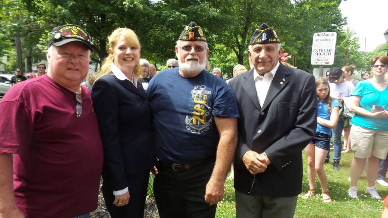 Milford honors those who sacrificed all From left: Vietnam veteran Tom Ryan, guest speaker Kelly Gaughan, Vietnam veteran Bill Malson, Vietnam and Cuban Blockade veteran and former borough council member Vincent Accordino (Photo by Frances Ruth Harris)