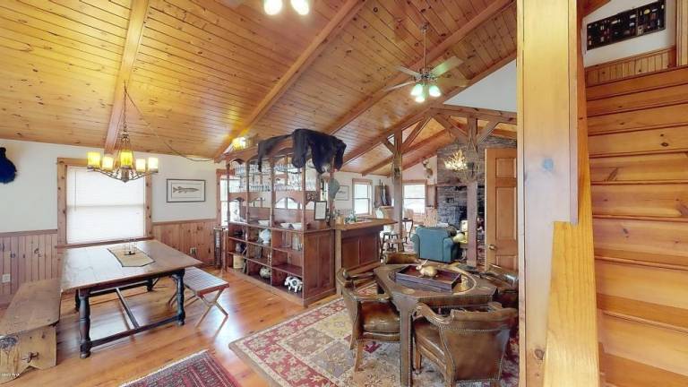 Custom three-bedroom on secluded, historic acre with lake rights Family room