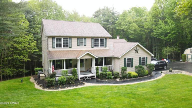 Beautifully designed home on 5+ acres offers space and privacy Beautifully designed home on 5+ acres offers space and privacy