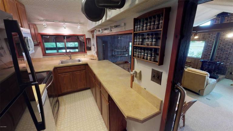 Four-bedroom lakefront contemporary is just steps from beach Kitchen