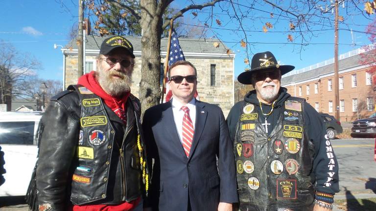 'Our freedom will never be free' District Attorney Ray Tonkin with veterans (Photo by Frances Ruth Harris)