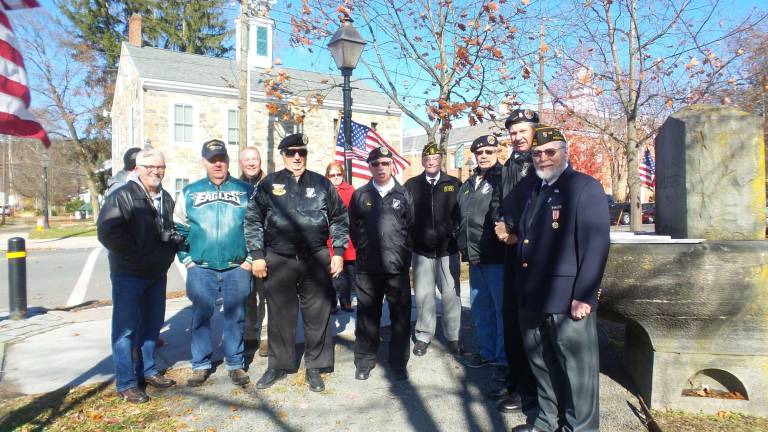 'Our freedom will never be free' County Commissioner Matt Osterberg (left) gathered with veterans at Soldiers and Sailors Monument (Photo by Frances Ruth Harris)